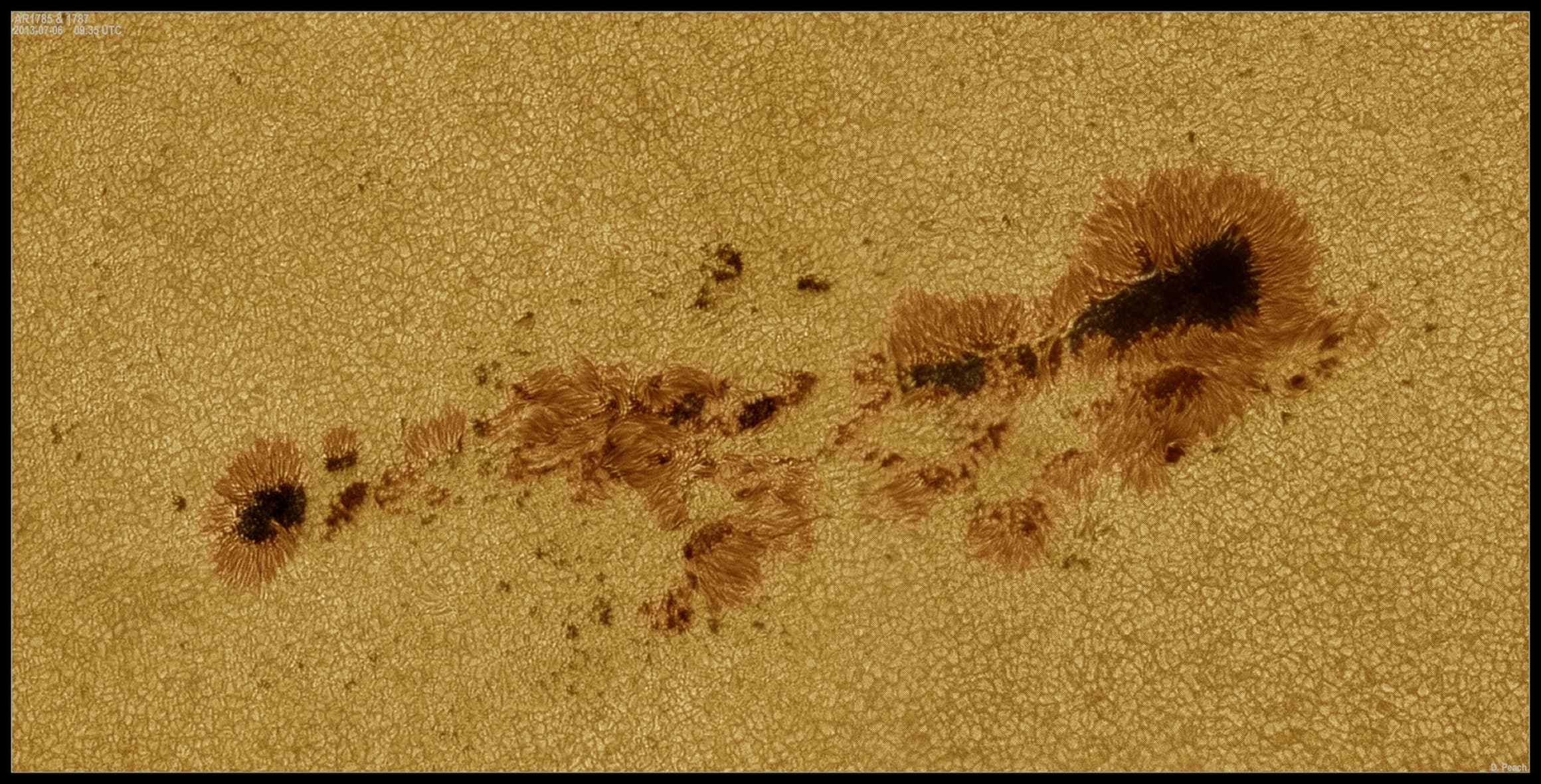 APOD: 2013 July 10 – Large Sunspots Now Crossing the Sun