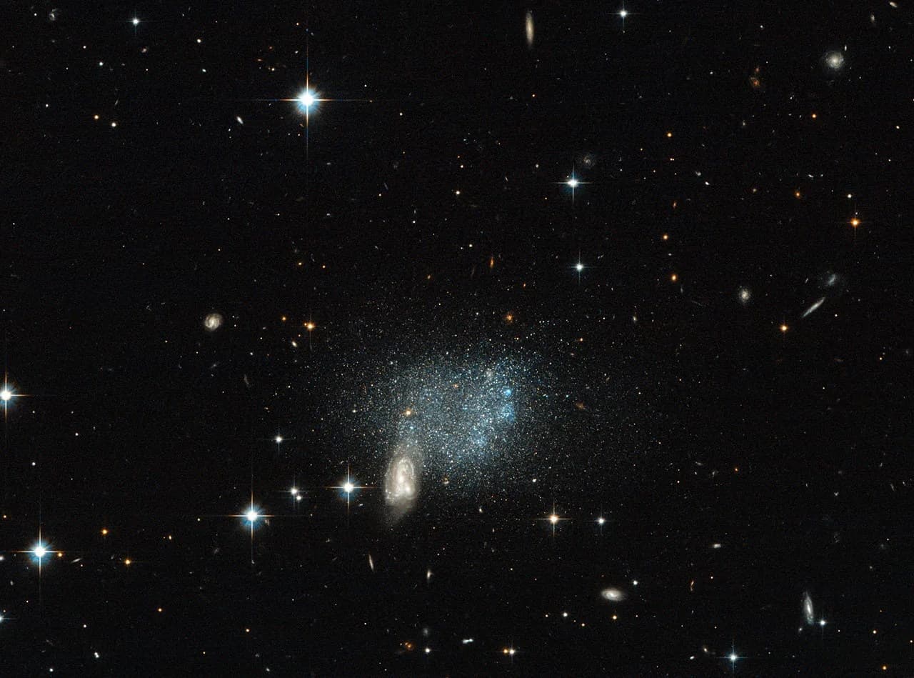 Hubble Sees Stars Fleeing a Cosmic Crash
