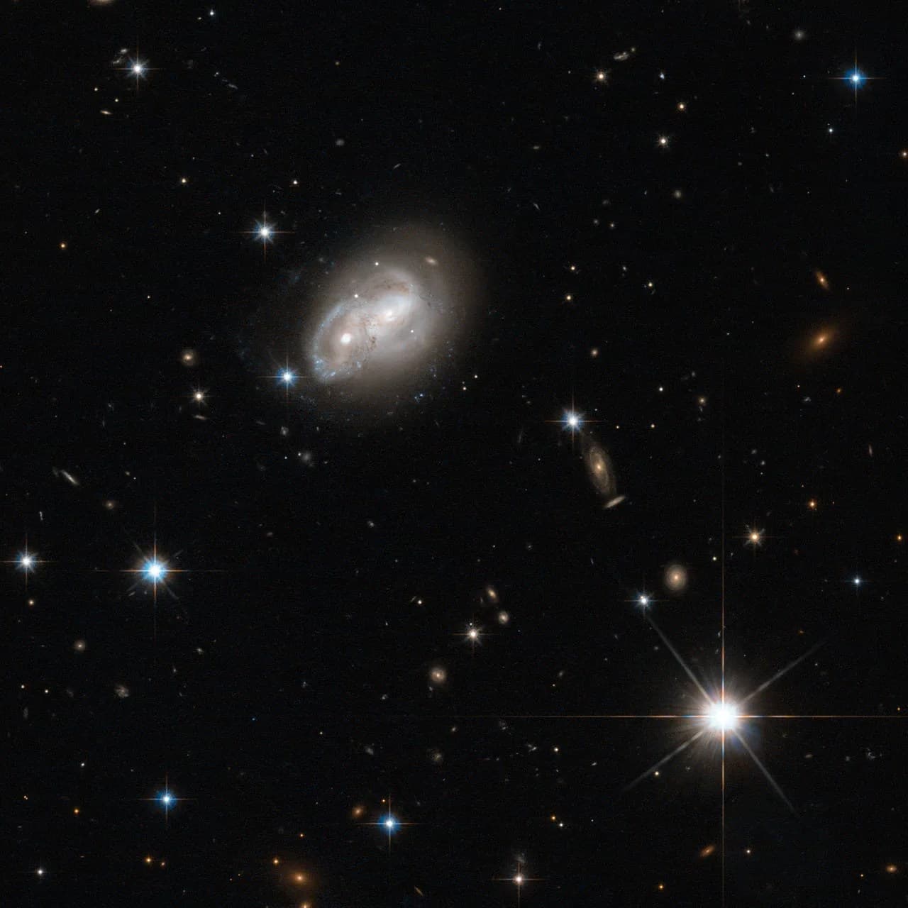 Hubble Eyes Galaxy as it Gets a Cosmic Hair Ruffling