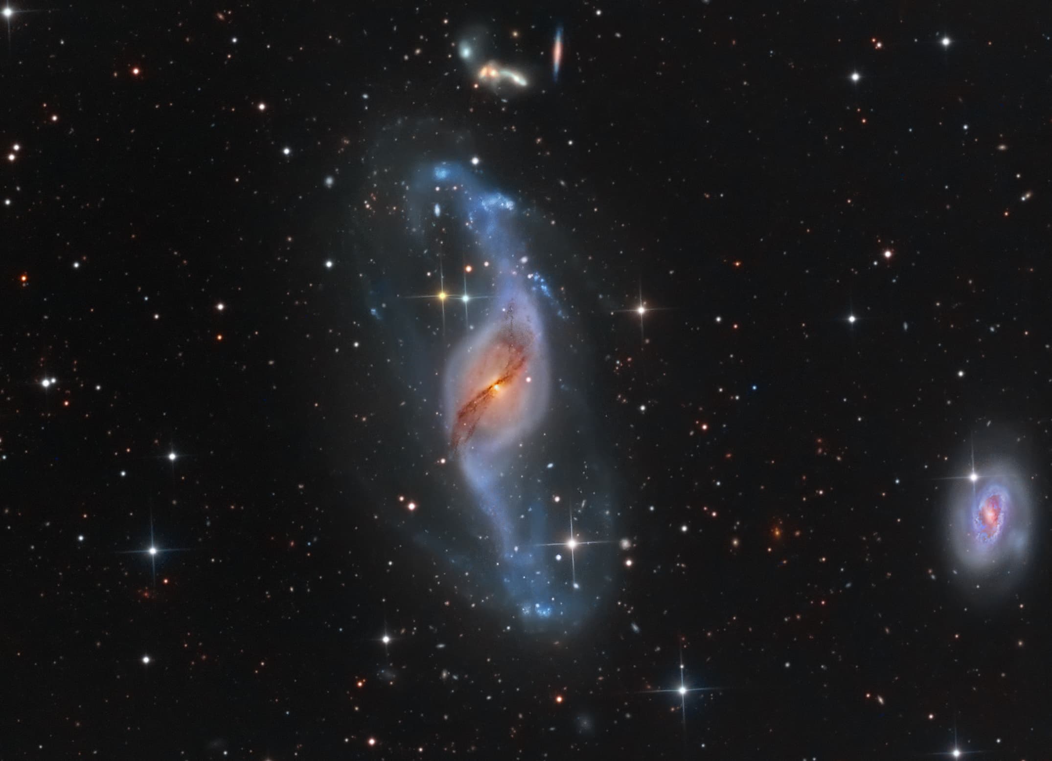 APOD: 2013 August 3 – Twisting with NGC 3718