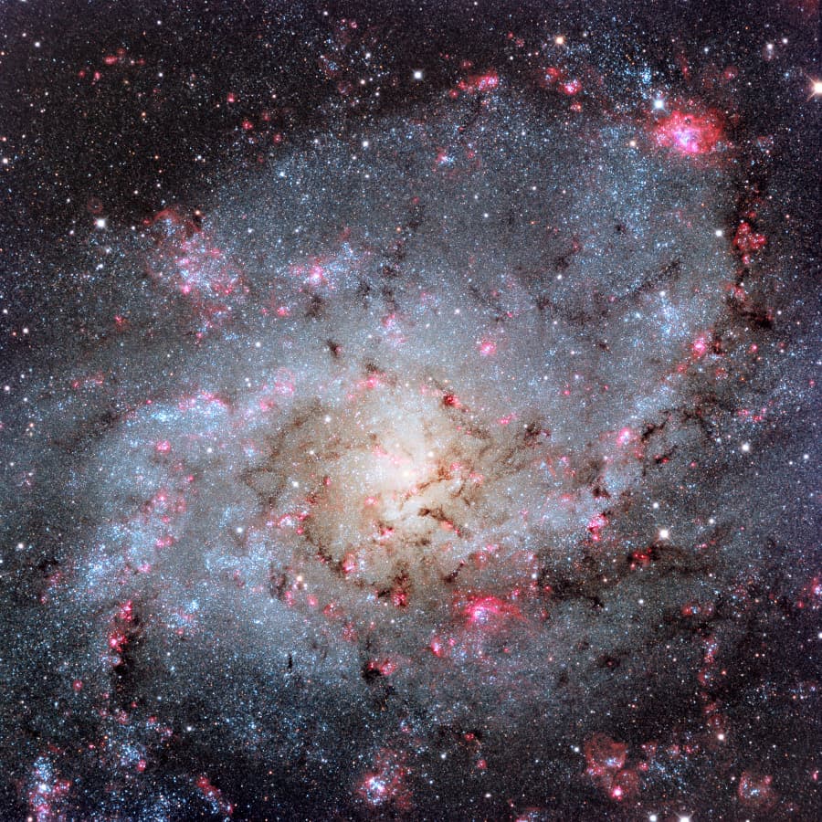 APOD: 2013 December 26 – The Hydrogen Clouds of M33