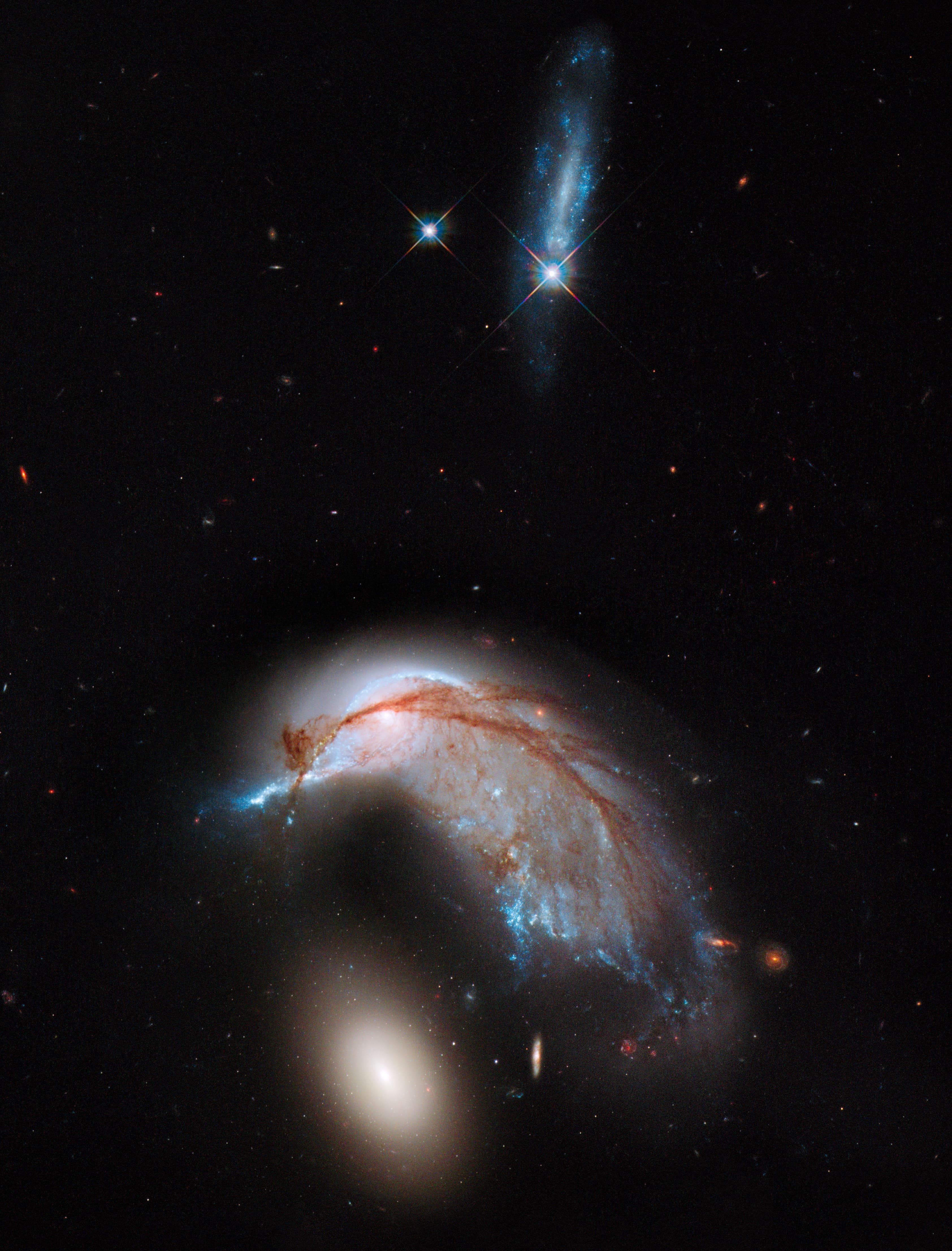APOD: 2013 June 24 – The Porpoise Galaxy from Hubble
