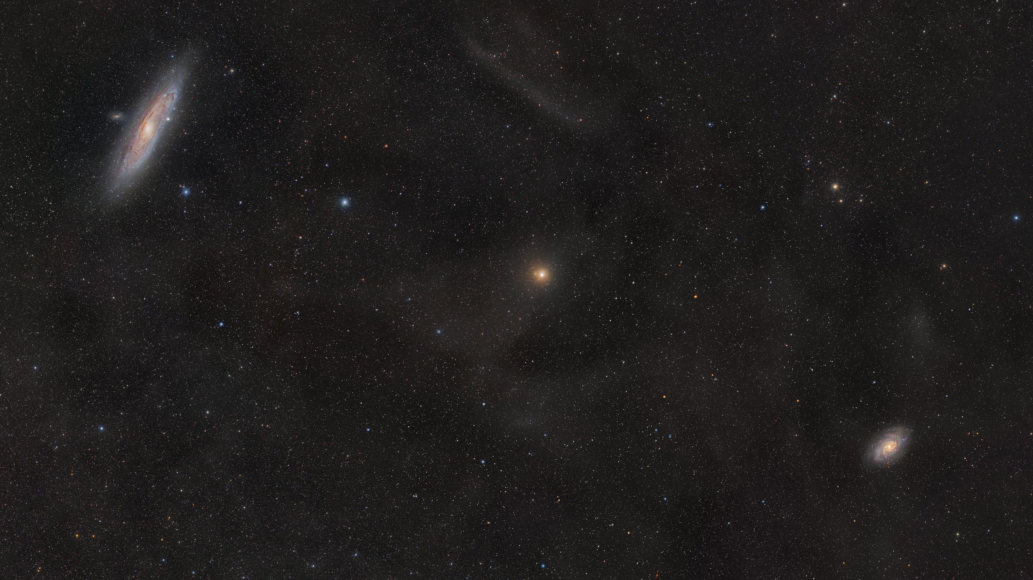 APOD: 2013 September 26 – M31 versus M33