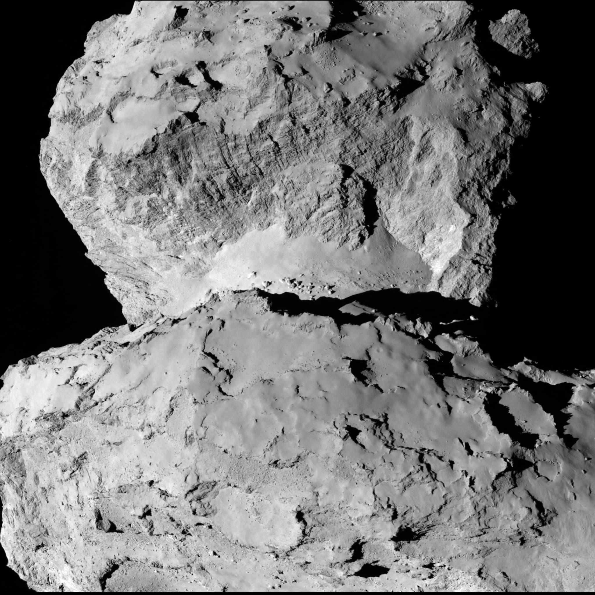 APOD: 2014 August 19 – Contrasting Terrains on Comet Churyumov Gerasimenko