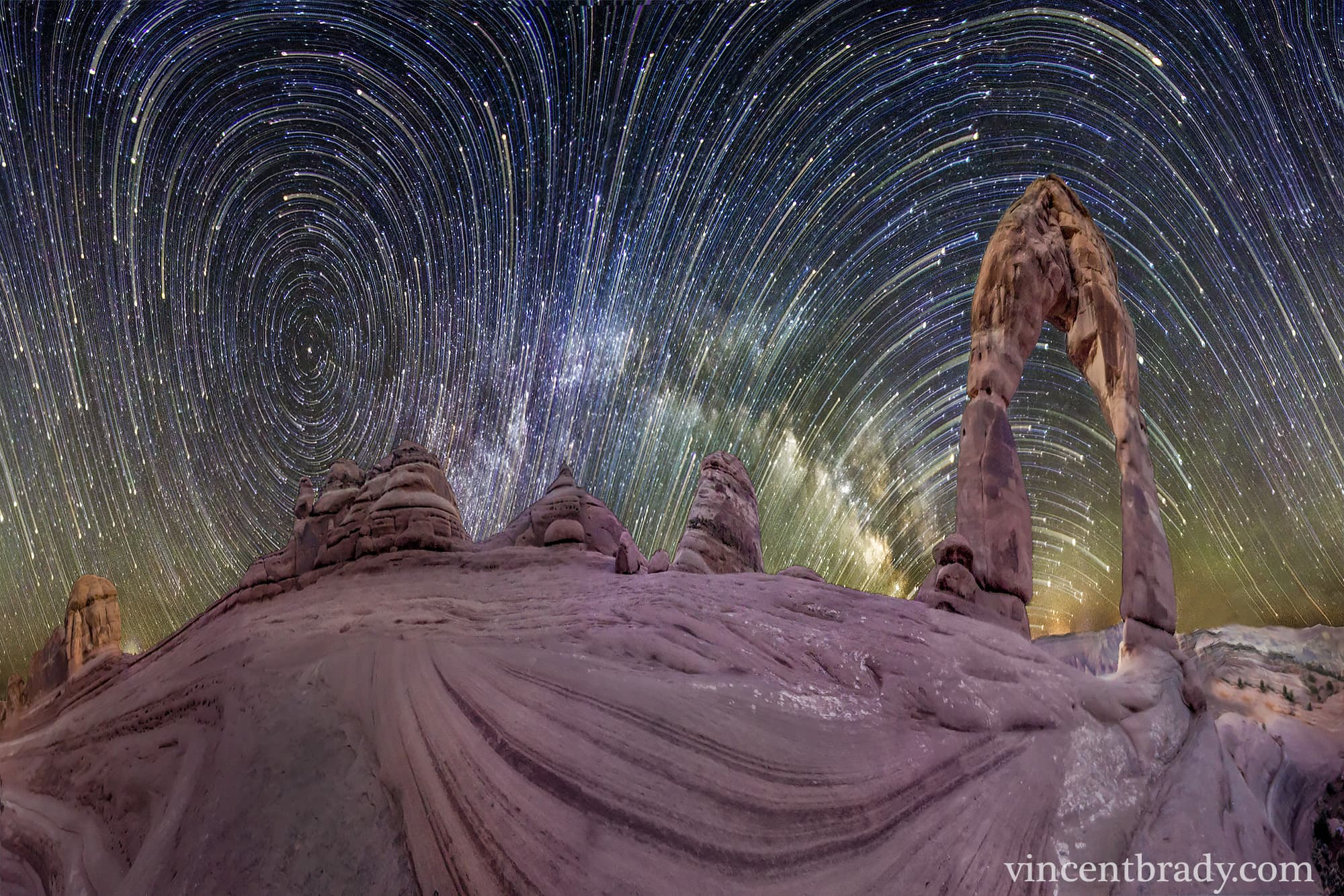 APOD: 2014 March 17 – Warped Sky: Star Trails over Arches National Park