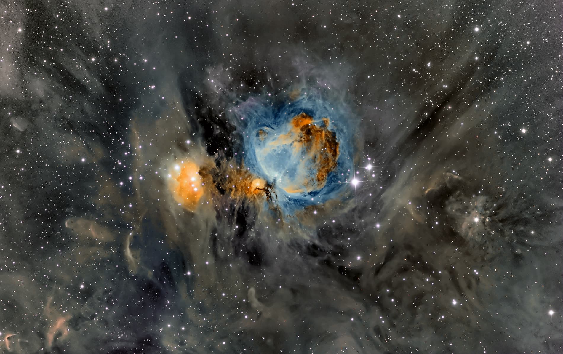 APOD: 2014 March 25 – Orion Nebula in Surrounding Dust
