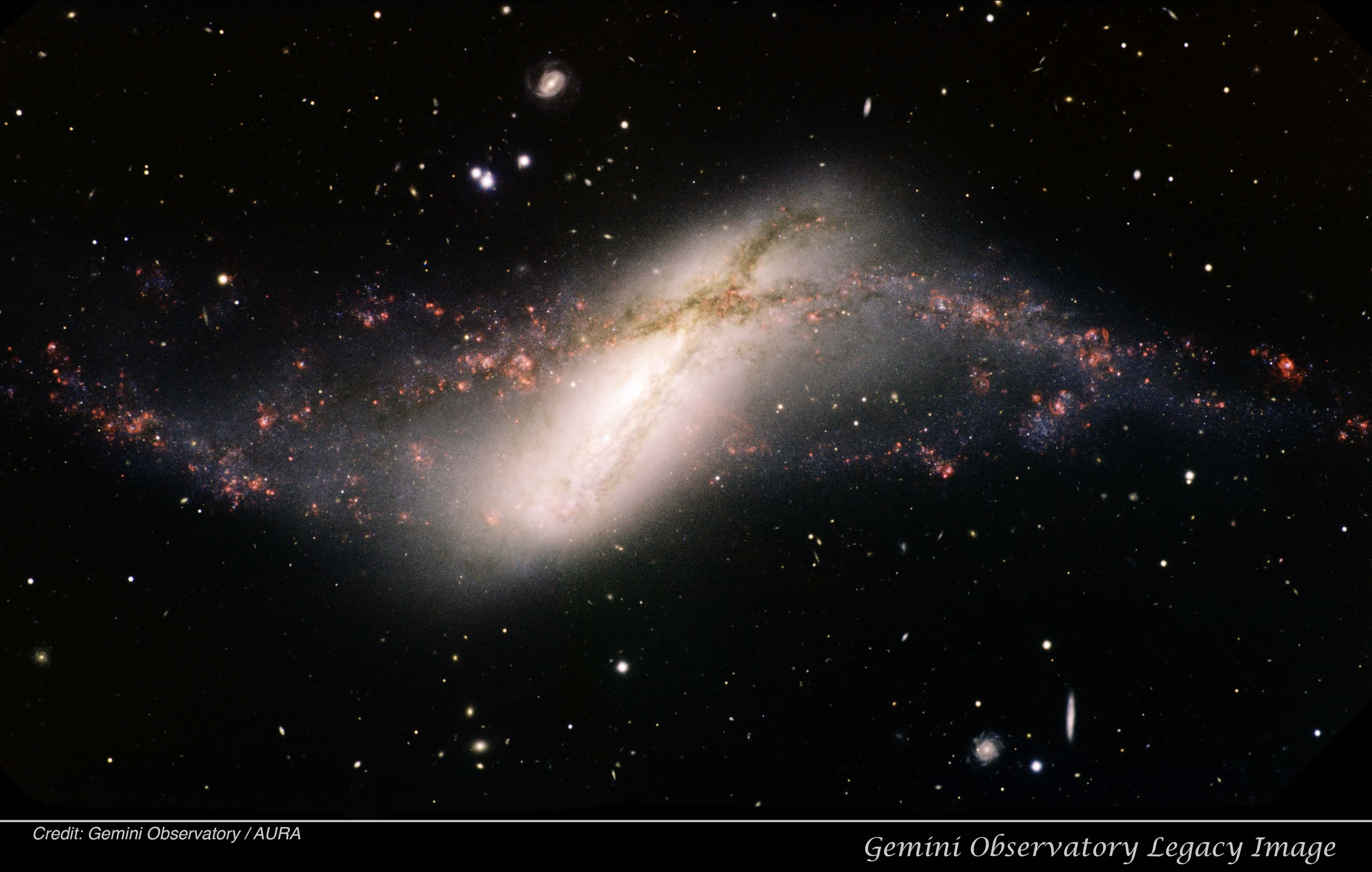 APOD: 2014 November 8 – Polar Ring Galaxy NGC 660