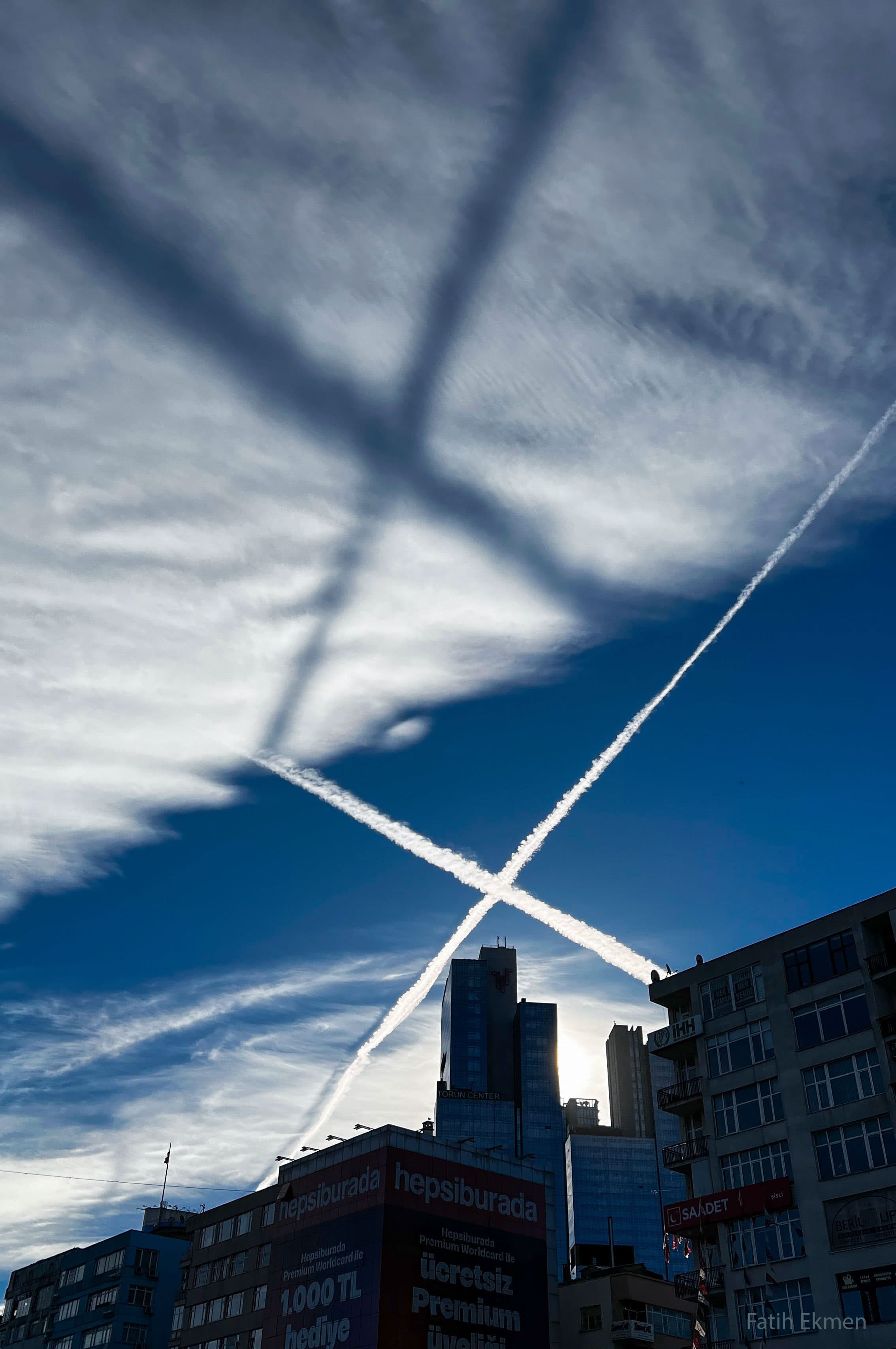 APOD: 2024 April 23 – Contrail Shadow X