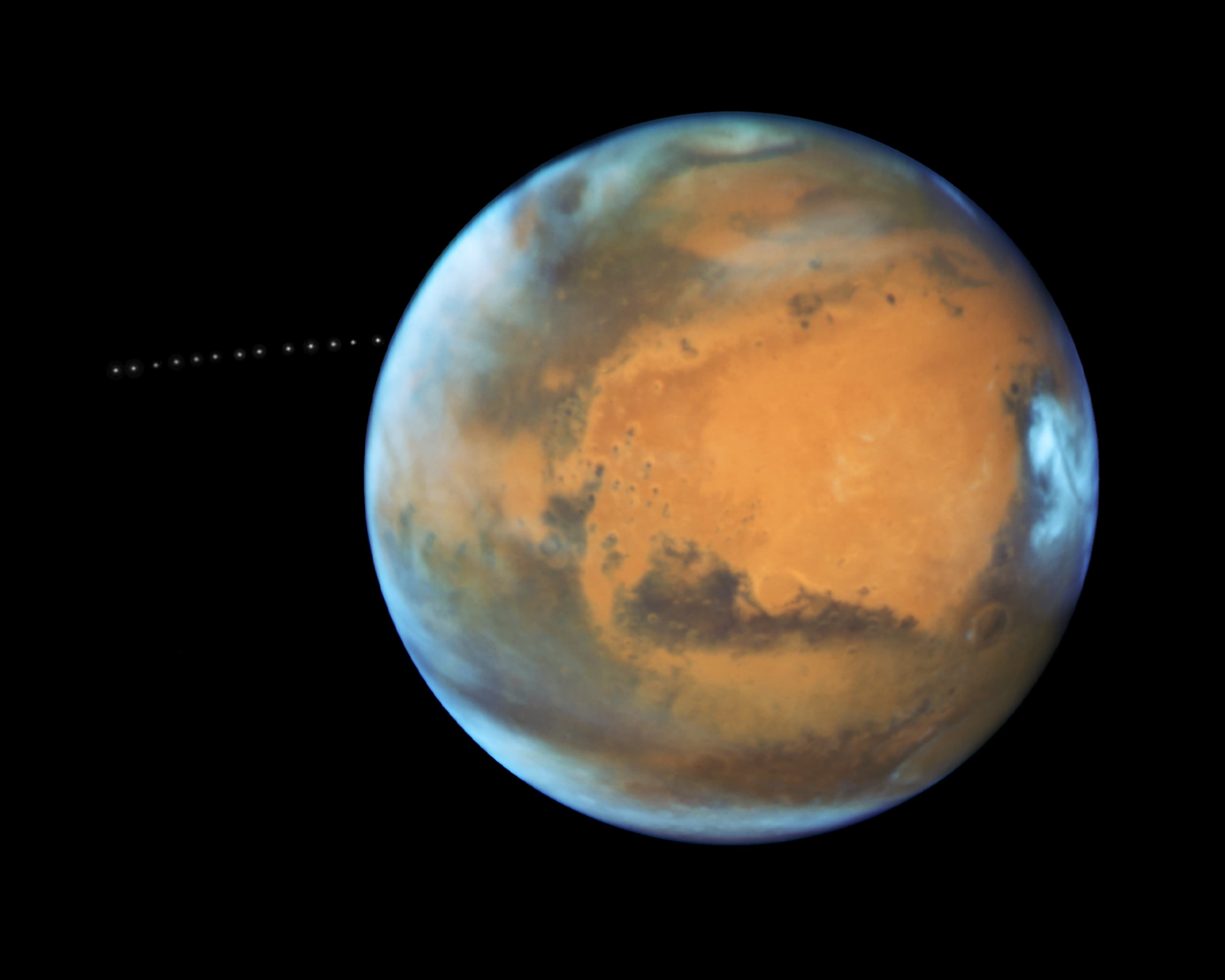 APOD: 2024 March 22 – Phobos: Moon over Mars