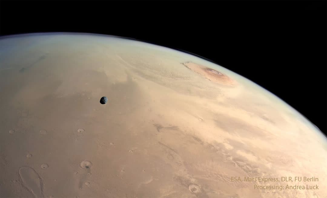 APOD: 2024 September 9 – Mars: Moon, Craters, and Volcanos