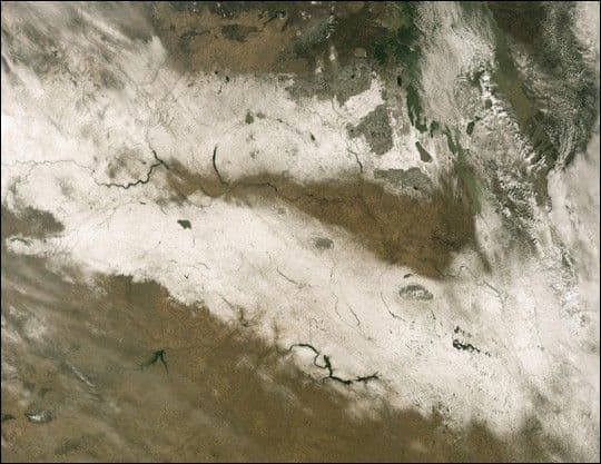 Early Snowstorm Sweeps Across Northern Plains