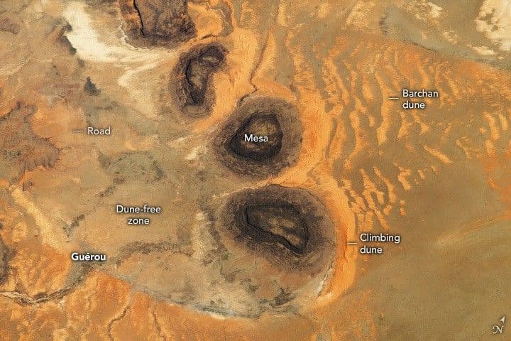 Black Mesas and Sand Dunes in Mauritania