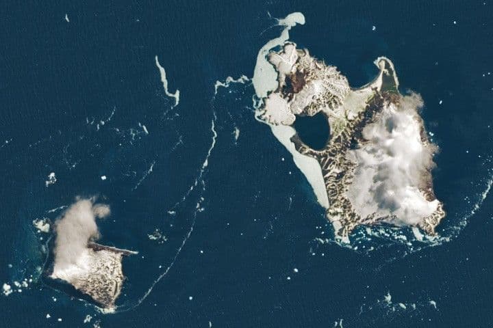 Islands of Fire and Ice Veiled in Cloud