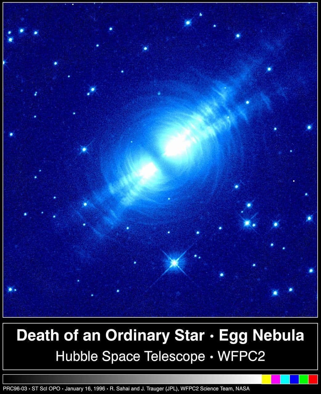 Hubble Finds Searchlight Beams and Multiple Arcs around a Dying Star