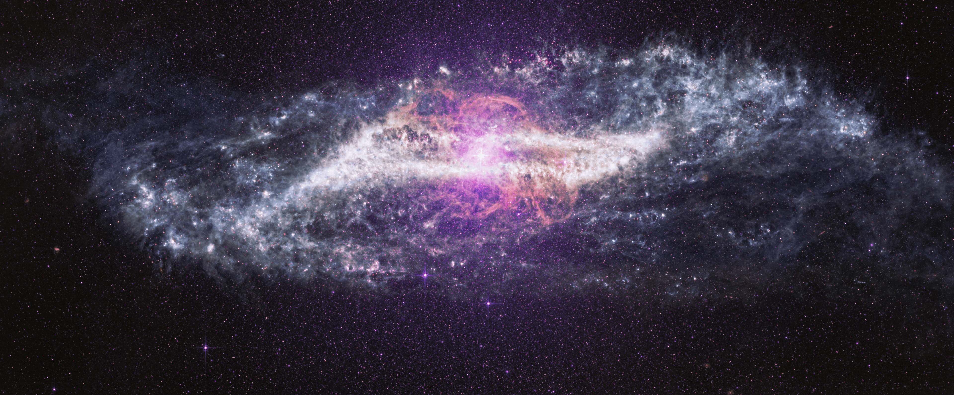 NASA Webb Uncovers Unusual Galaxy Shaped by Cosmic Collision