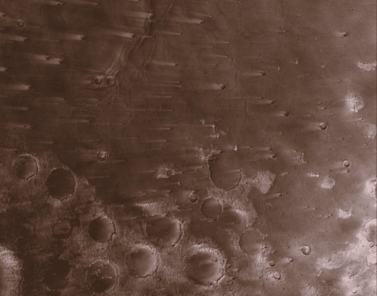 NASA’s Psyche Mission Spies Mars’ Wind-Blown Craters During Close Approach