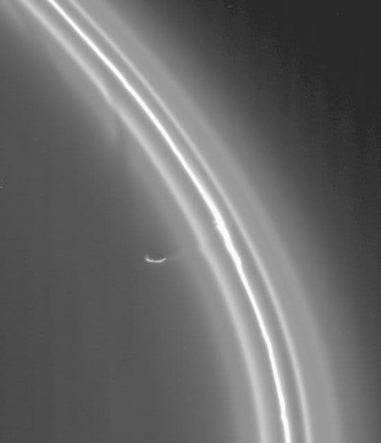 Cassini Captures Saturn Moon Red-Handed