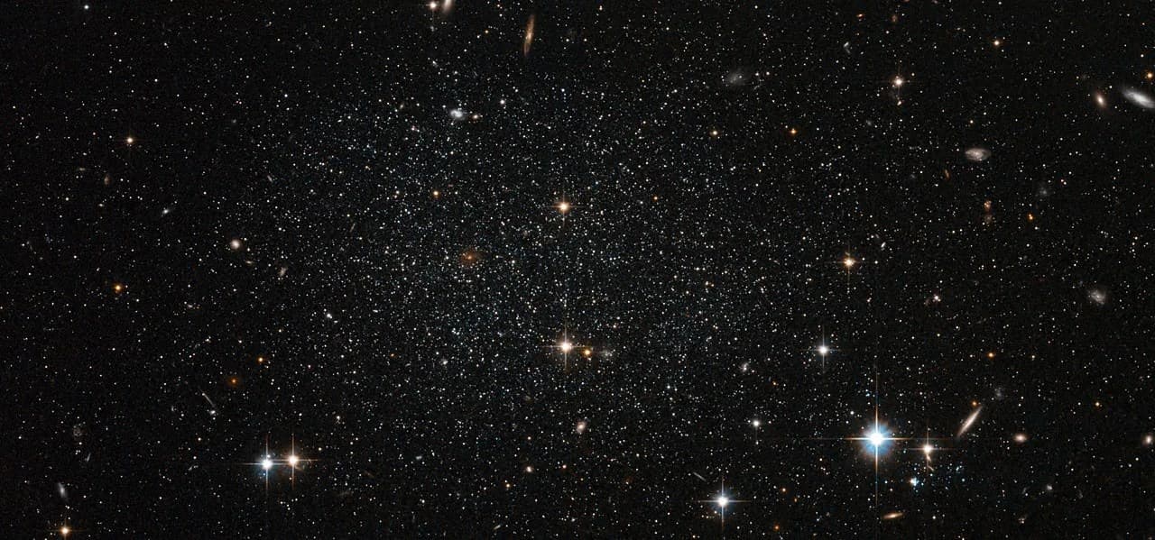 Antlia Dwarf Galaxy Peppers the Sky with Stars