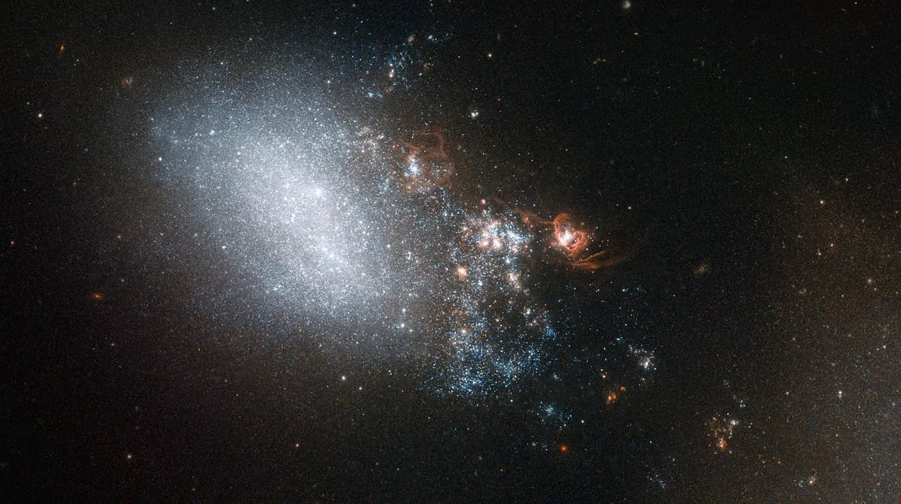 Hubble Sees Starbursts in the Wake of a Fleeting Romance