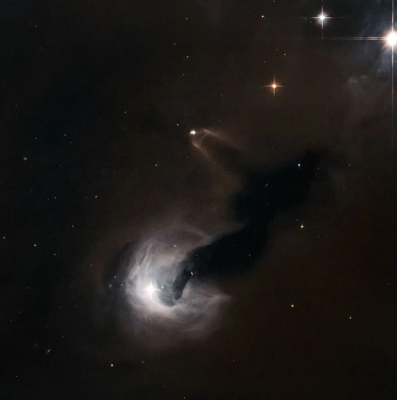 Hubble Looks at Light and Dark in the Universe