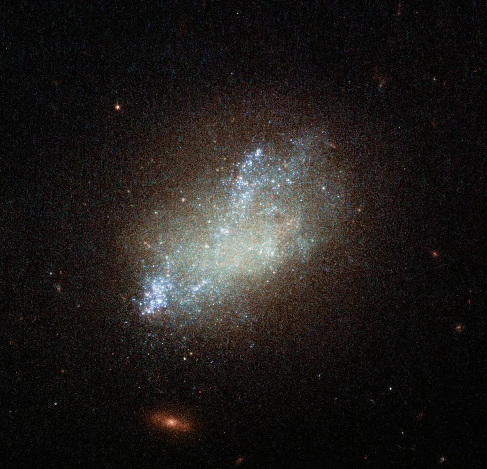 Hubble Paints a Spattering of Blue