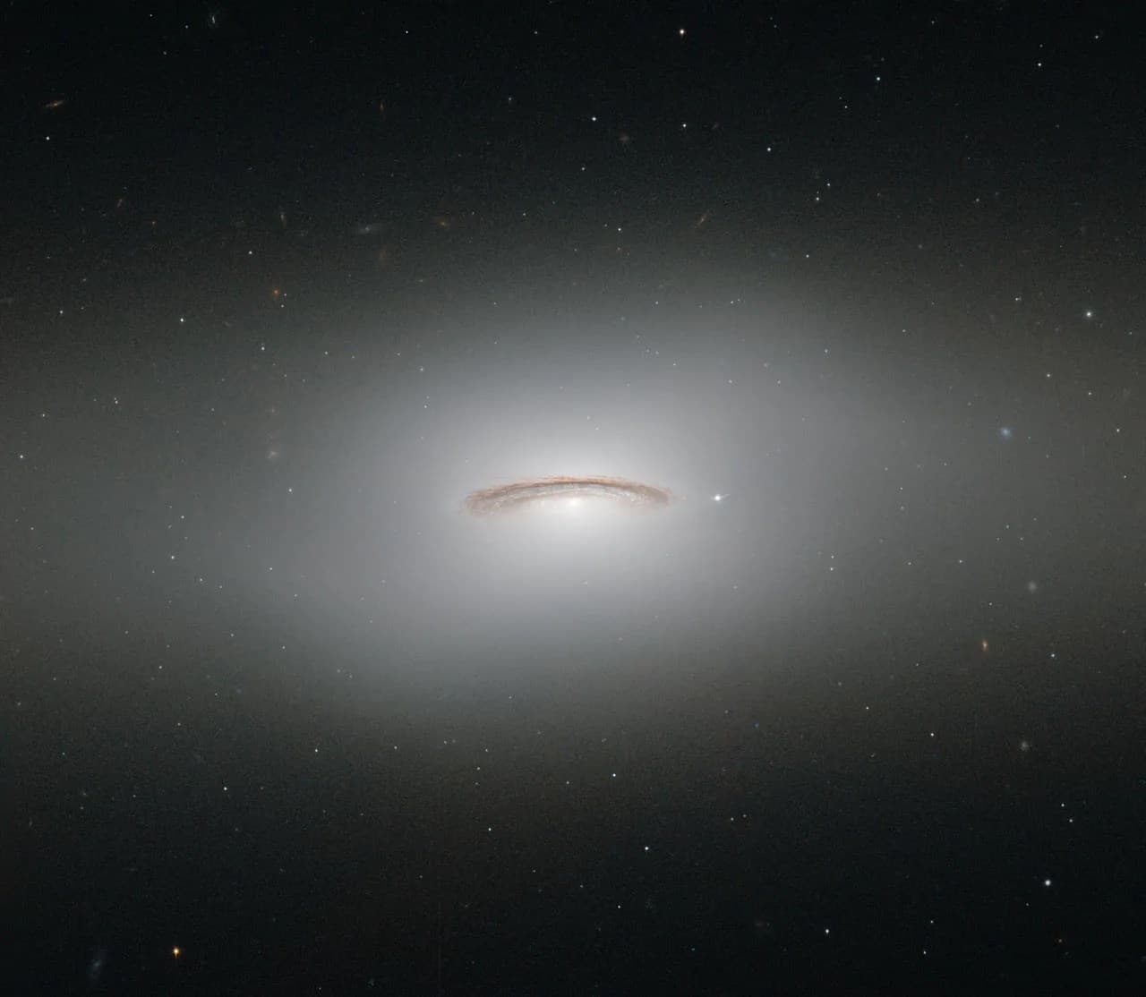 Hubble Views the Whirling Disk of NGC 4526