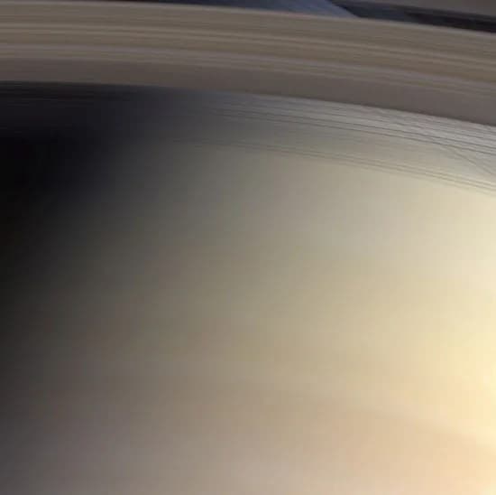 Strings of Shadowy Rings Drape Saturn
