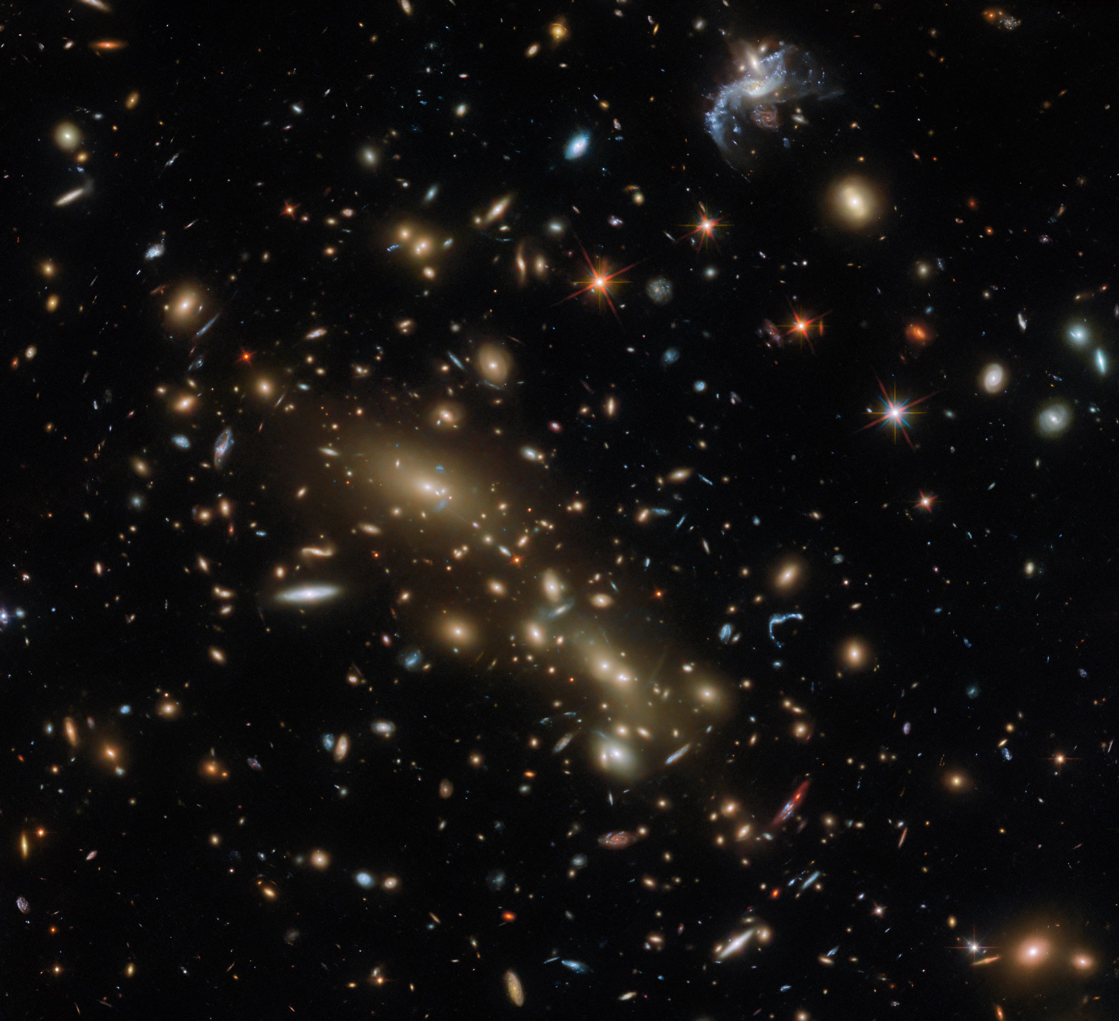 Hubble Views a Double Cluster of Glowing Galaxies